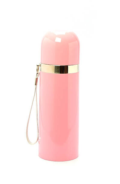 Pink thermo flask on the white background
