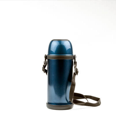 Blue thermos for hot and cold drinks on a white background.