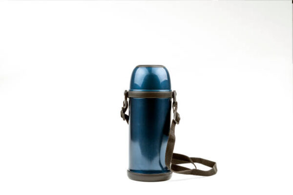 Blue thermos for hot and cold drinks on a white background.